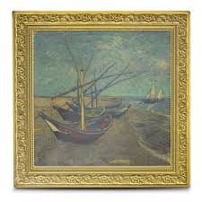 Gold-framed painting of fishing boats on a sandy shore, some in water, under a cloudy sky.
